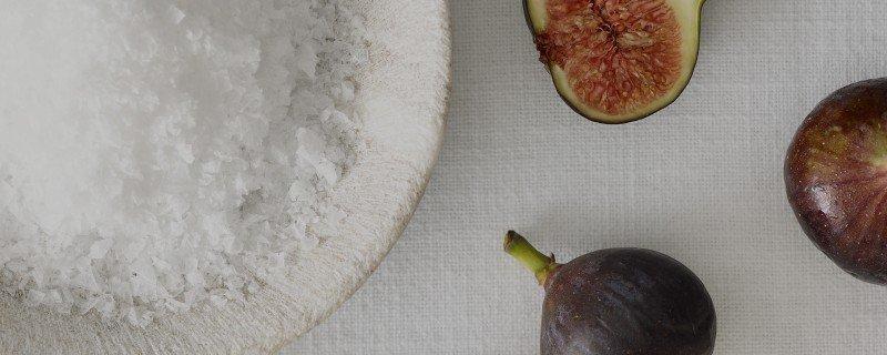 a fig is cut in half and sitting on a table