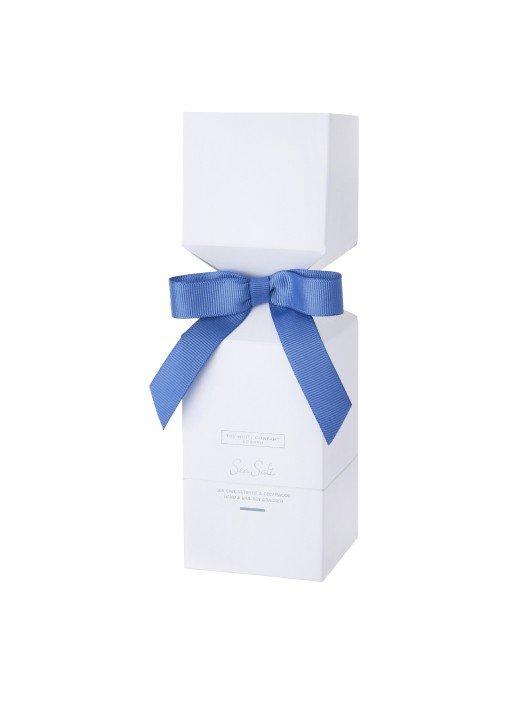 a white box with a blue ribbon on top