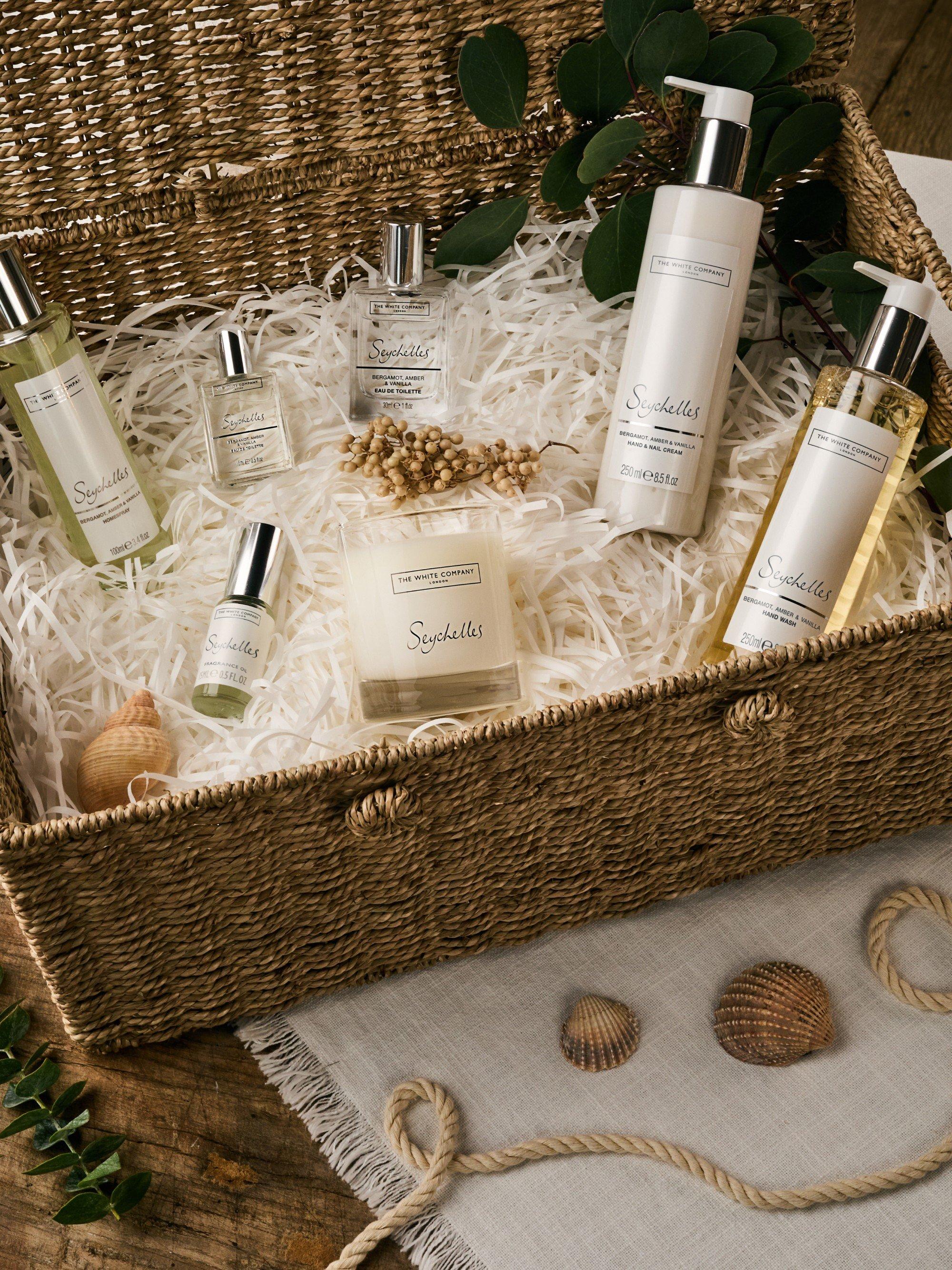 a basket filled with various types of body care products on a table