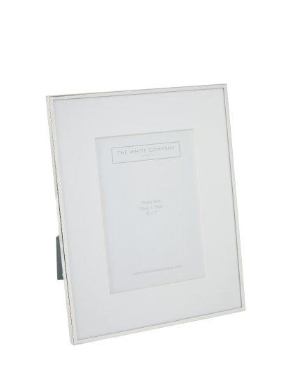 a white picture frame with a white background