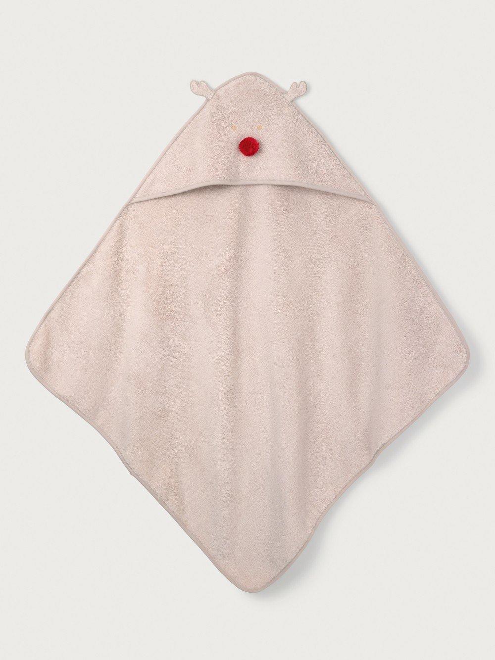 a small white towel with a red nose on it