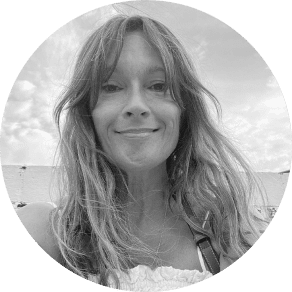 a woman smiling in a circle with a white background