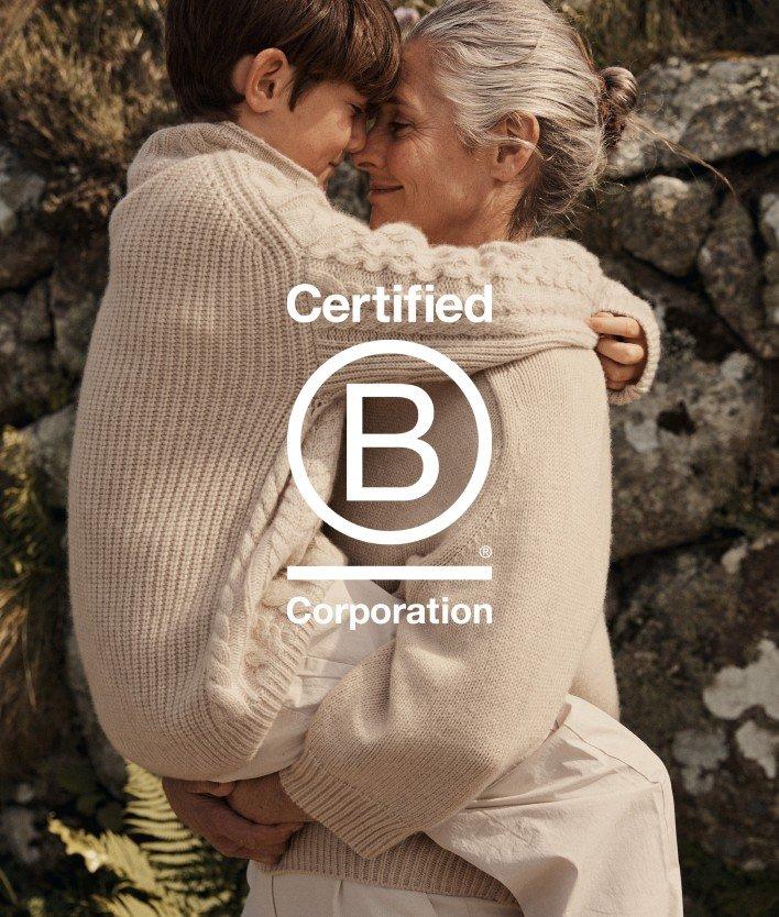 a woman hugging a child with the words certified by b