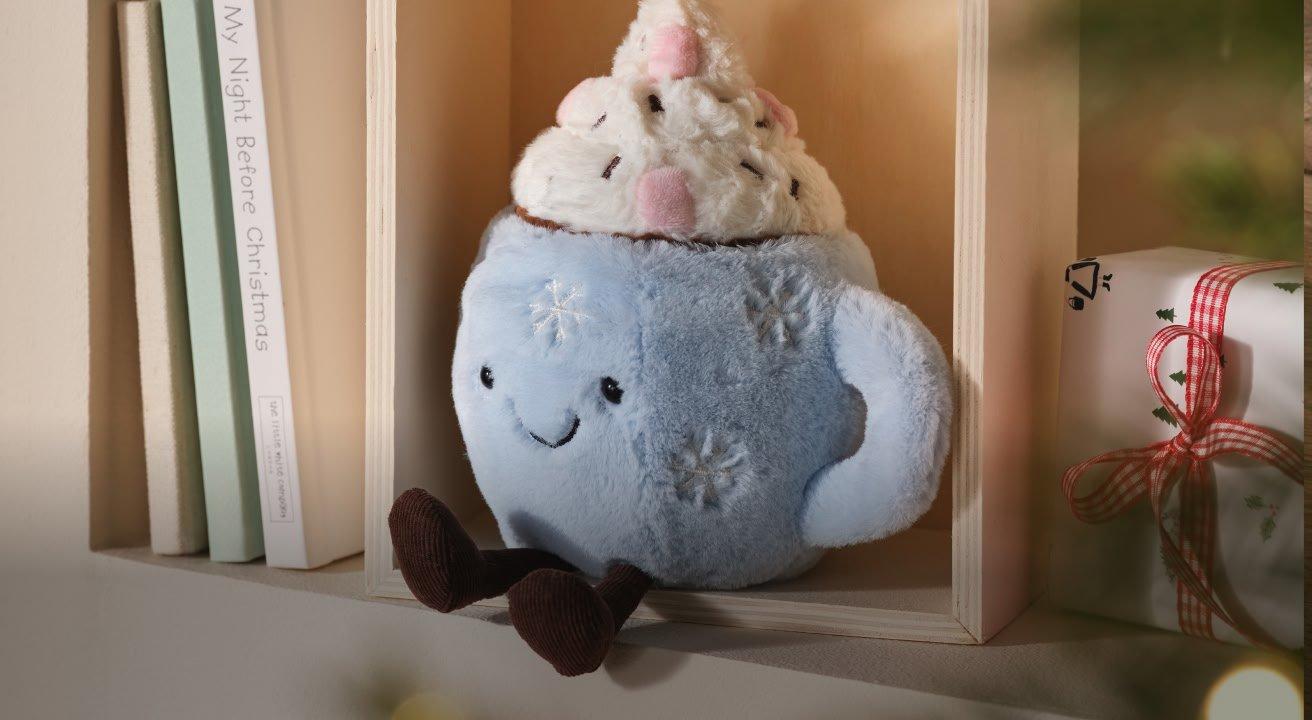 a close up of a gold hoop earring and a gold hoop earring