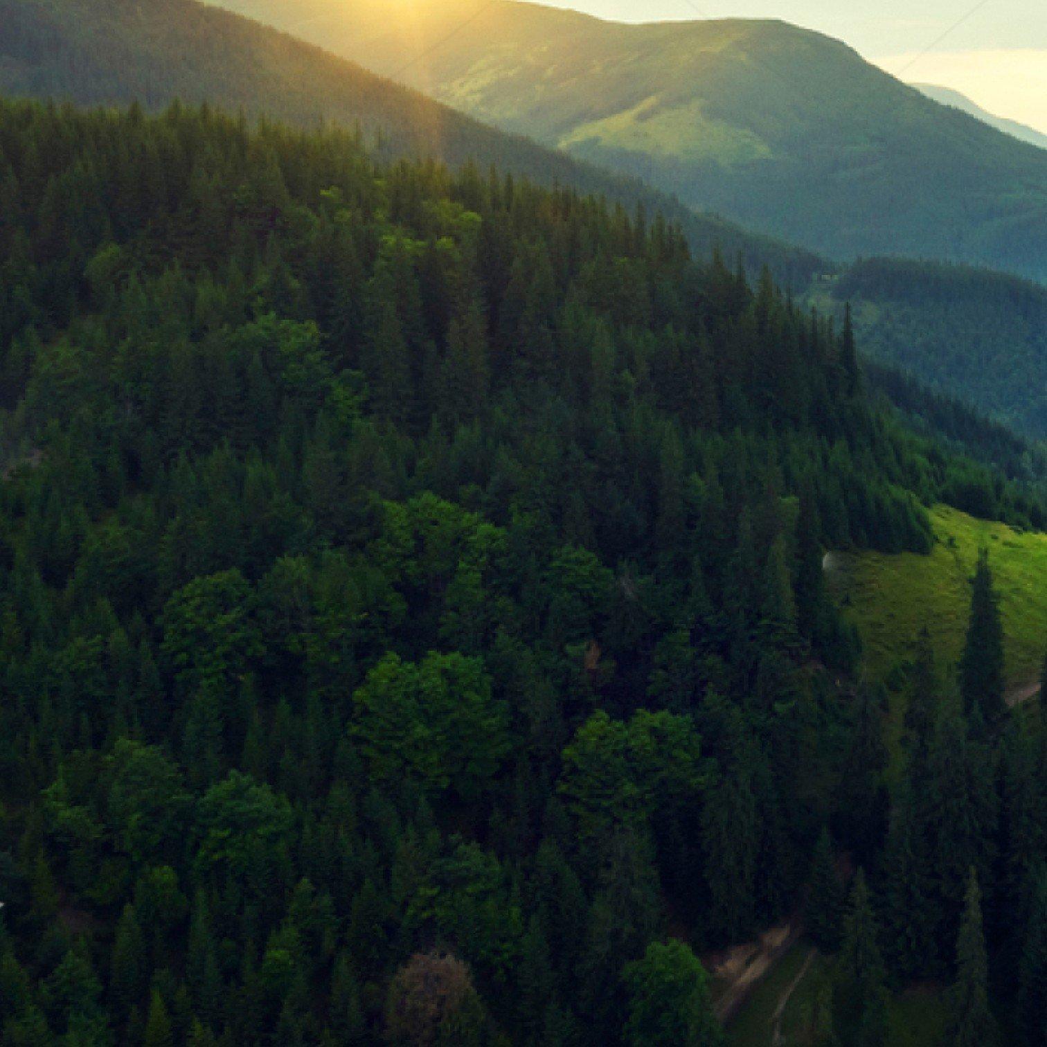 a view of a mountain range with a valley in the middle
