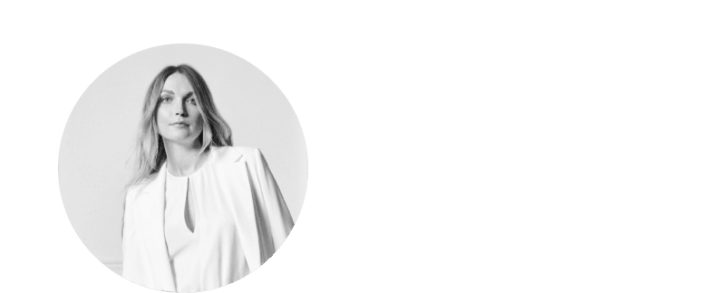 a woman in a white blazer is in a circle