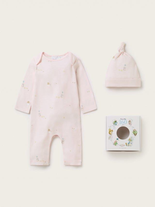 a baby's pink outfit and hat set