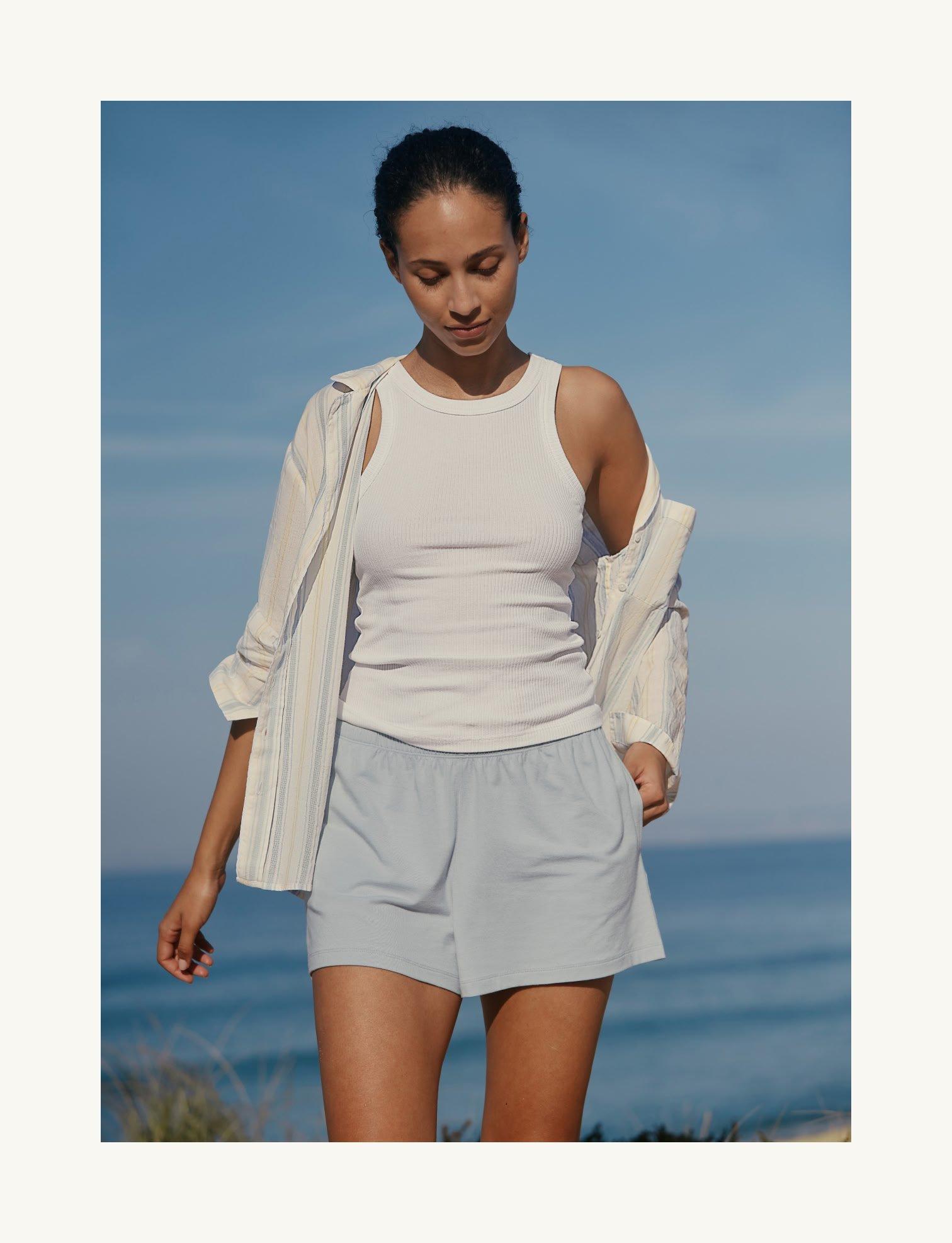 woman wearing pyjamas on beach
