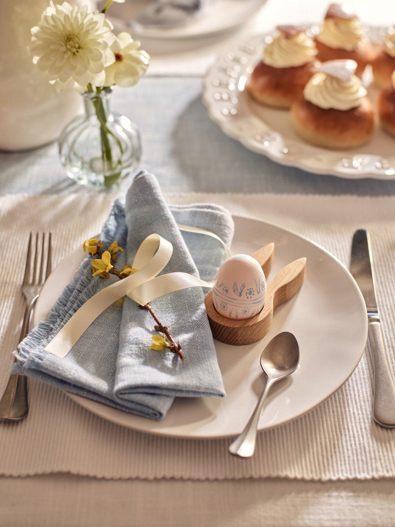 a plate with a fork and knife on it next to a plate with a spoon and a fork