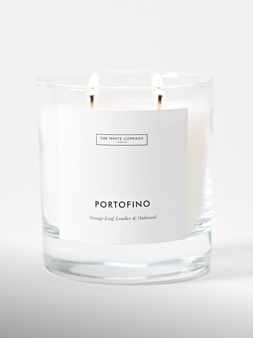 a candle with a label that says portofino on it