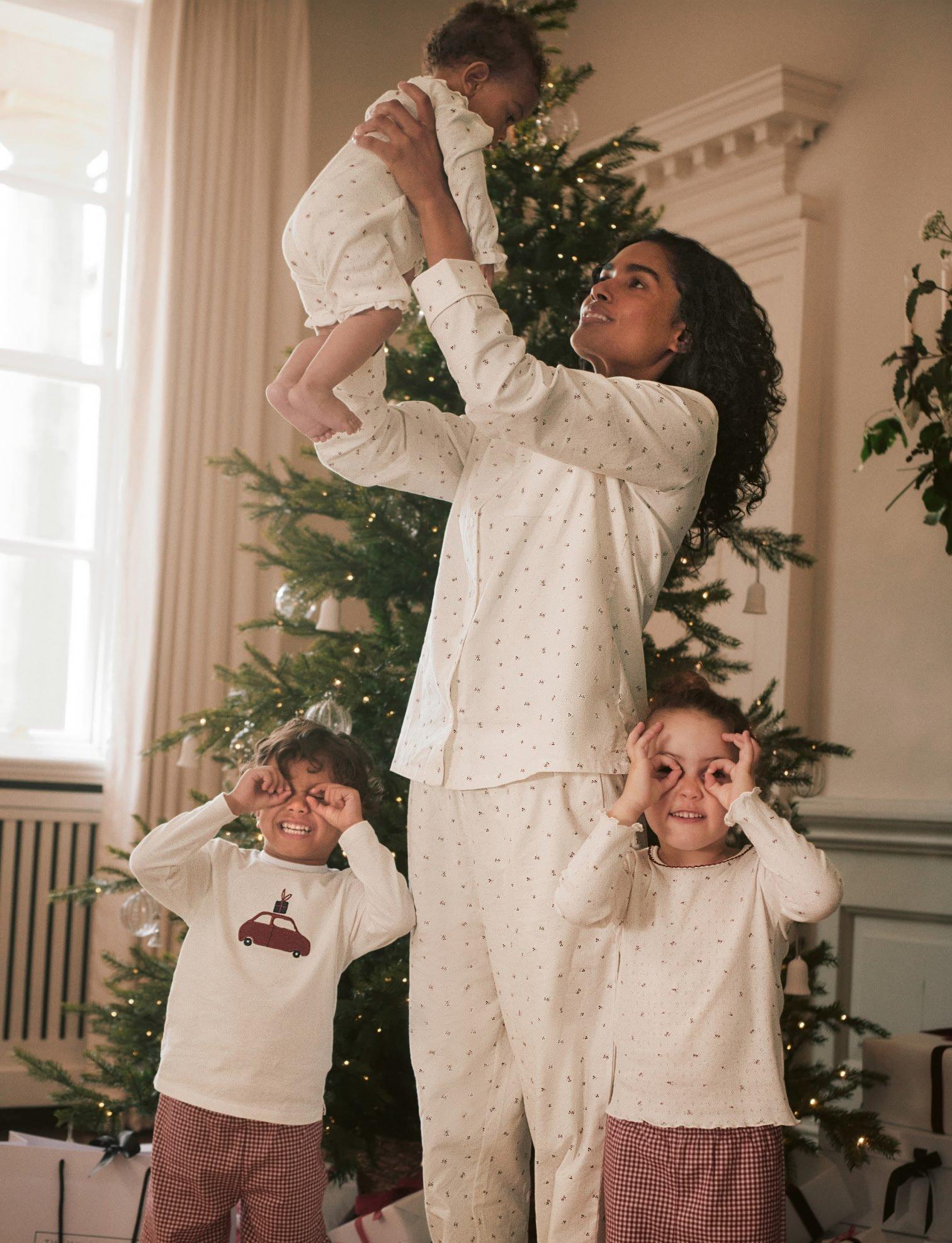 woman and children in pyjamas