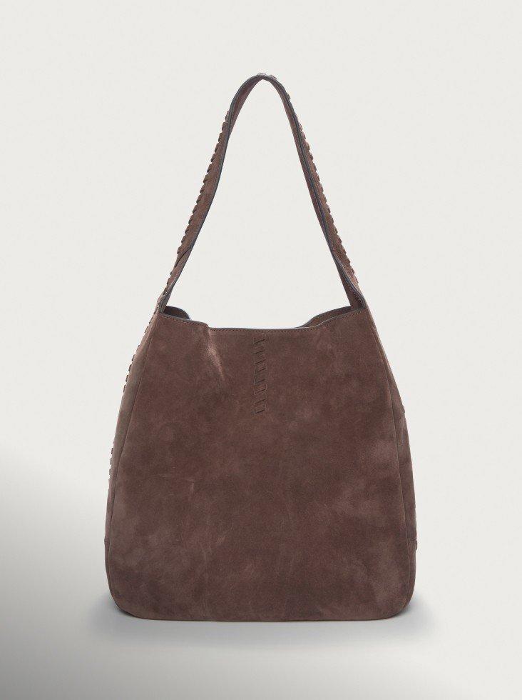 the brown leather bag is shown against a white background