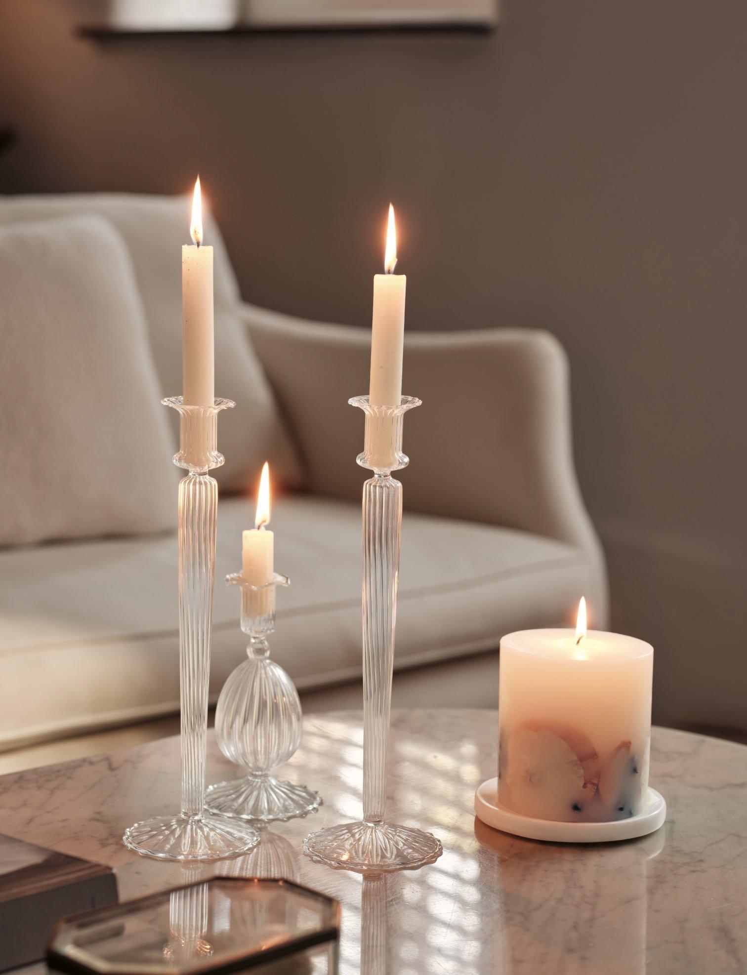 a table with a candle and some other items on it