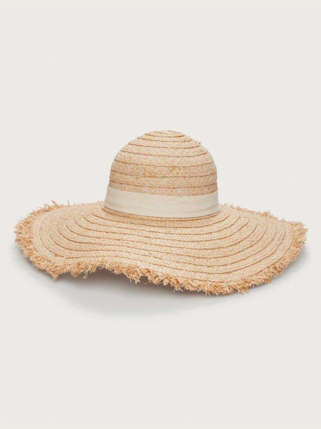 a straw hat with a white background and a fringed brim