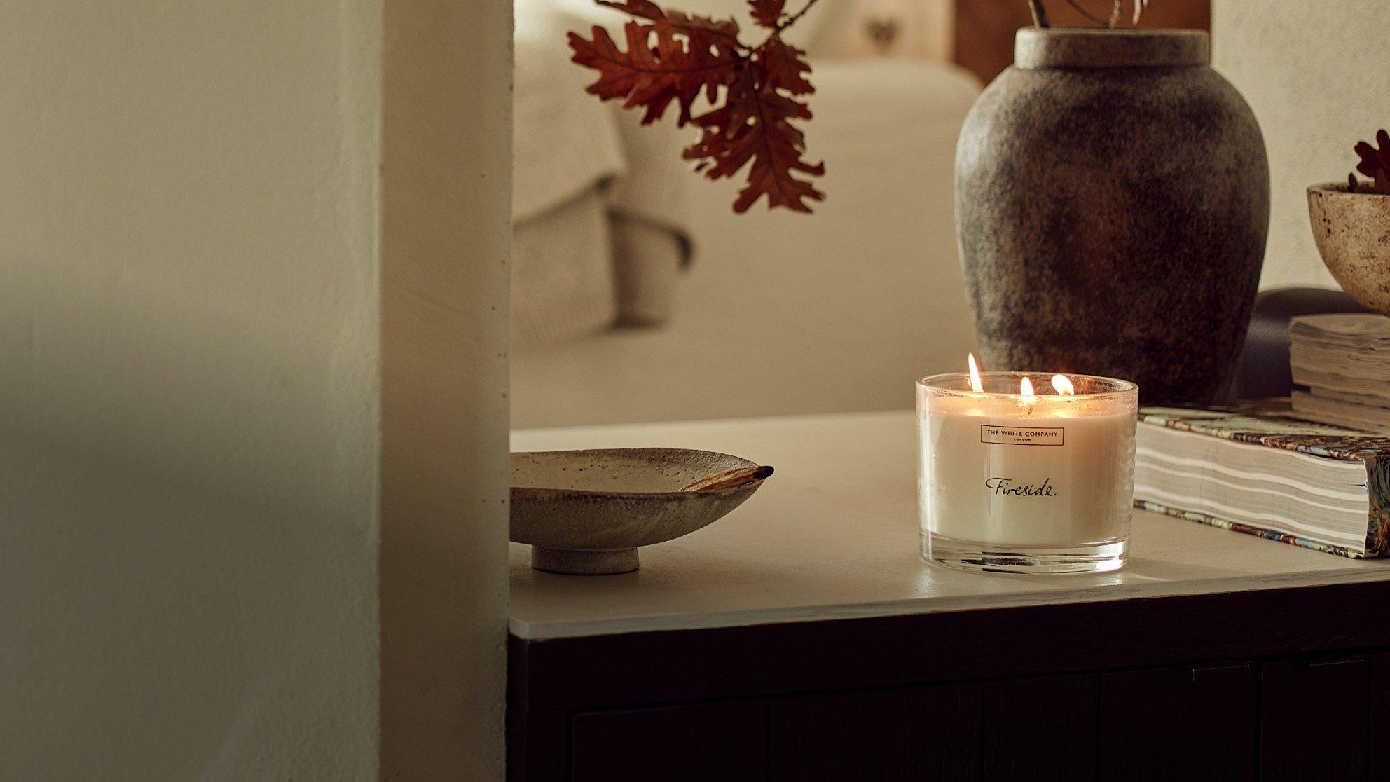 a collection of a collection of candles and other items on a table