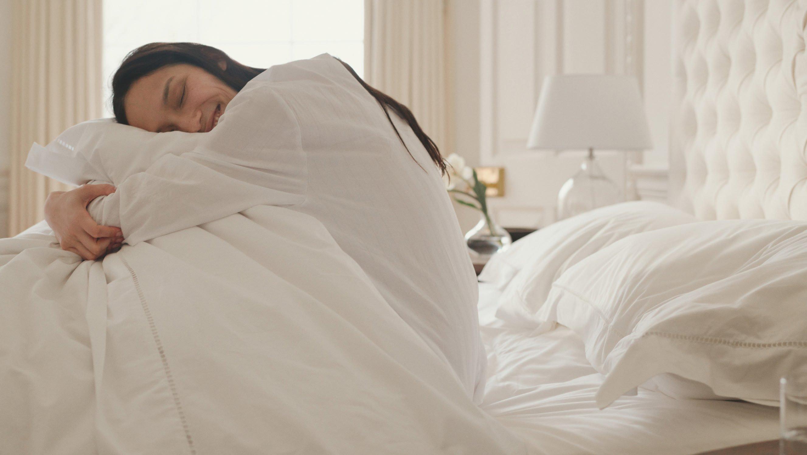 a table with candles and a plant on it with a candle