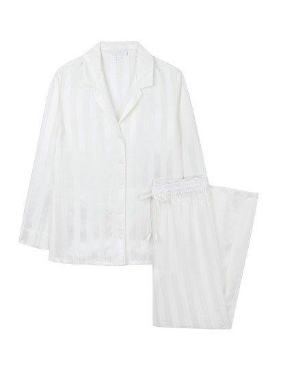 a white pajama set with a matching pants and a shirt