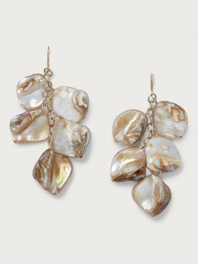 two pairs of earrings with shells hanging from them