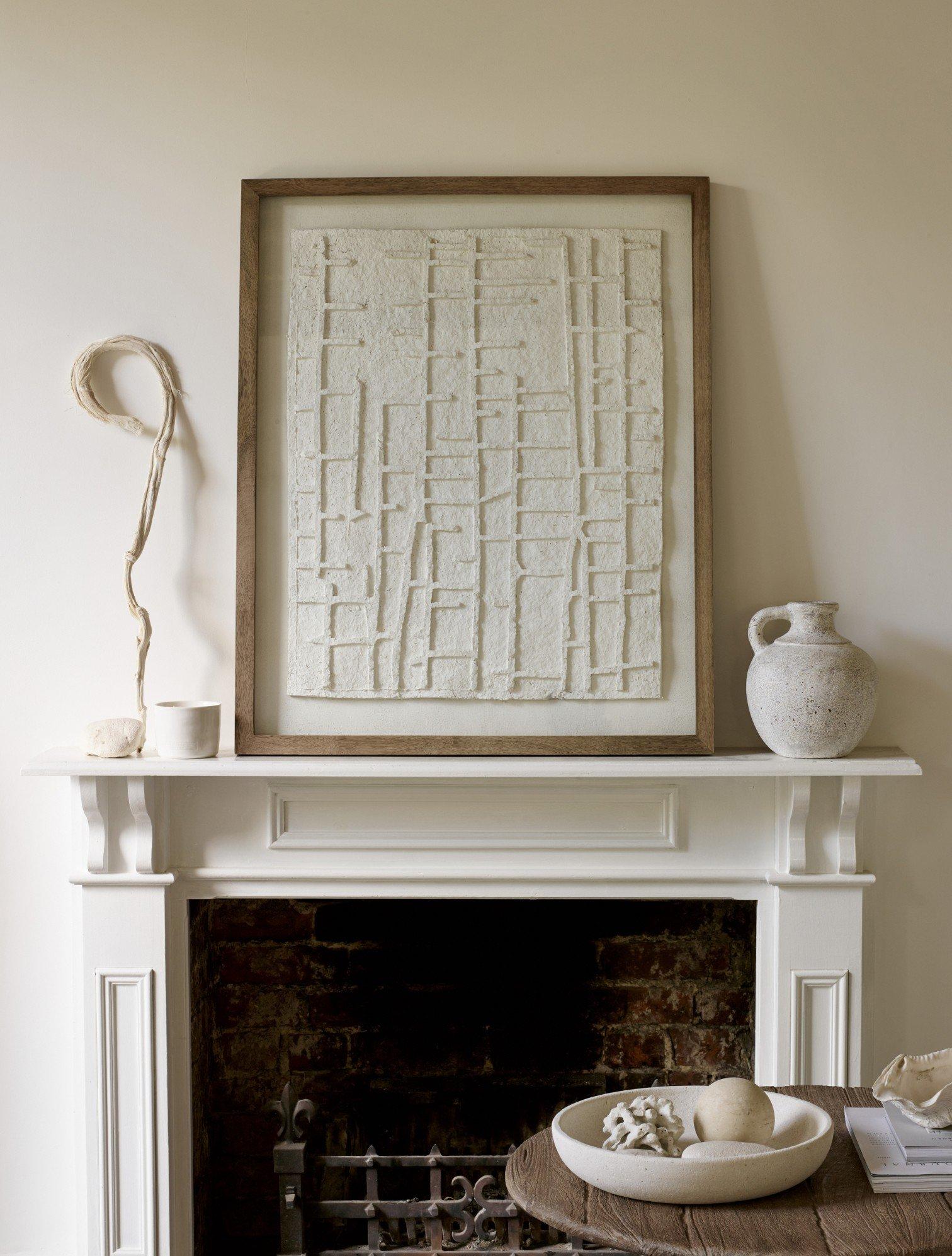 art frame on a fireplace