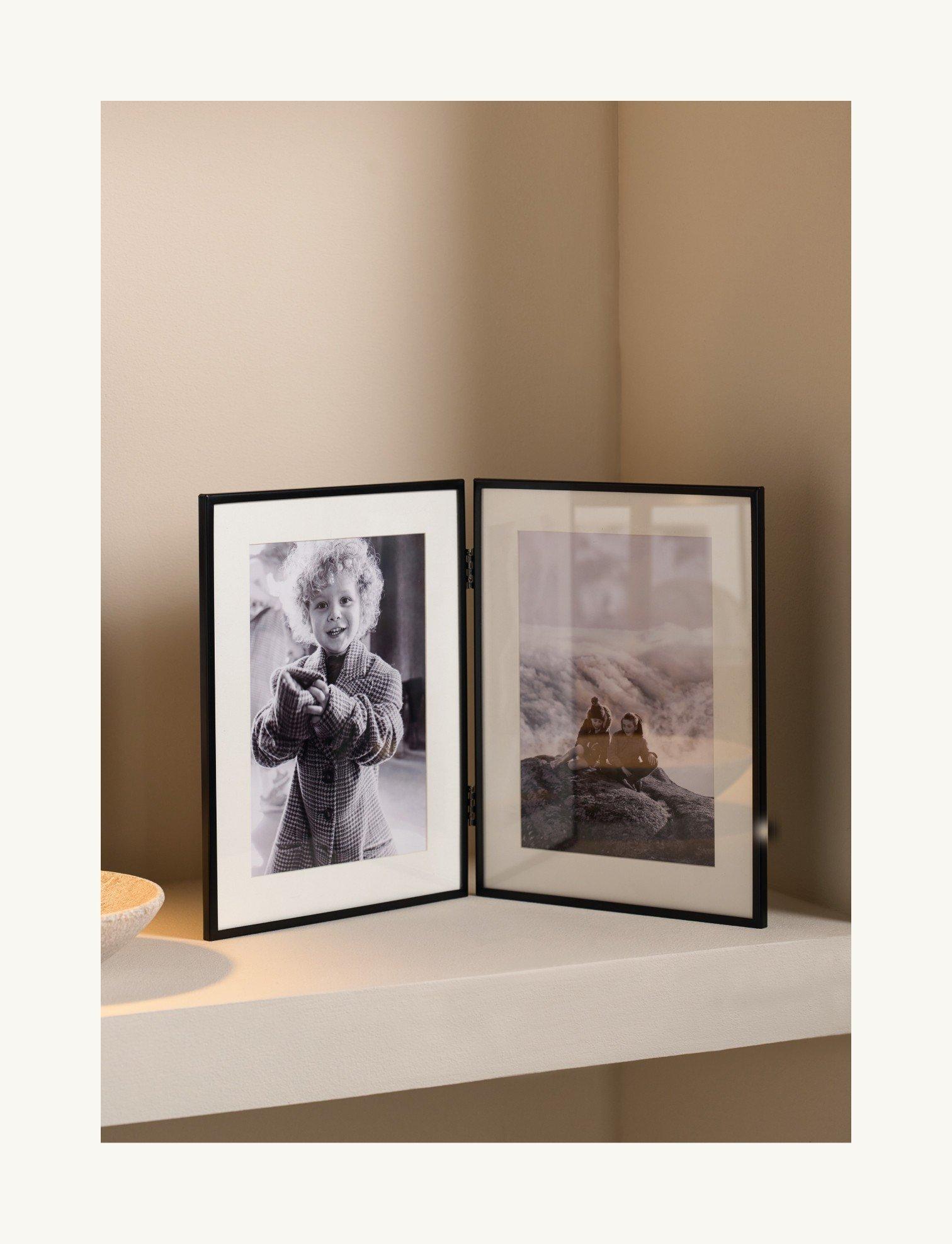 two black and white pictures are displayed in a frame