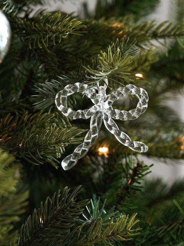 a close up of a christmas ornament hanging from a tree
