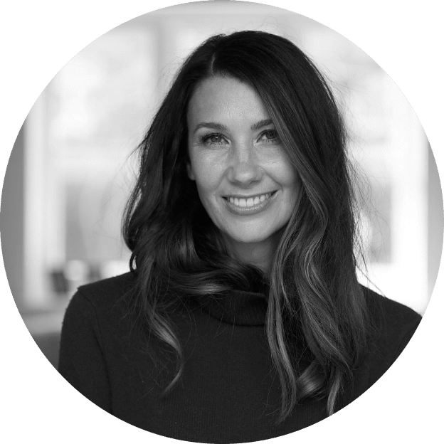 a woman with long hair smiling in a circle