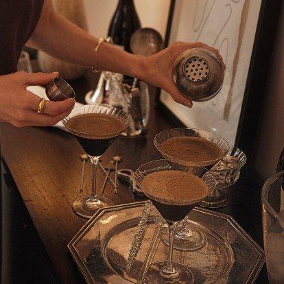 a woman with long hair smiling in a circle