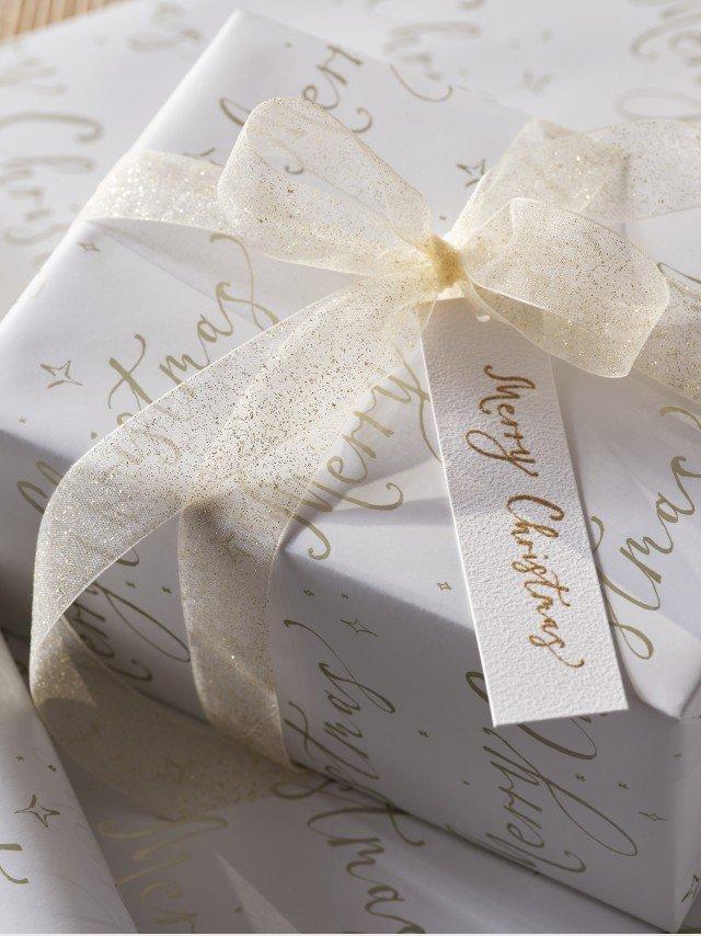 a close up of a wrapped gift with a bow on it
