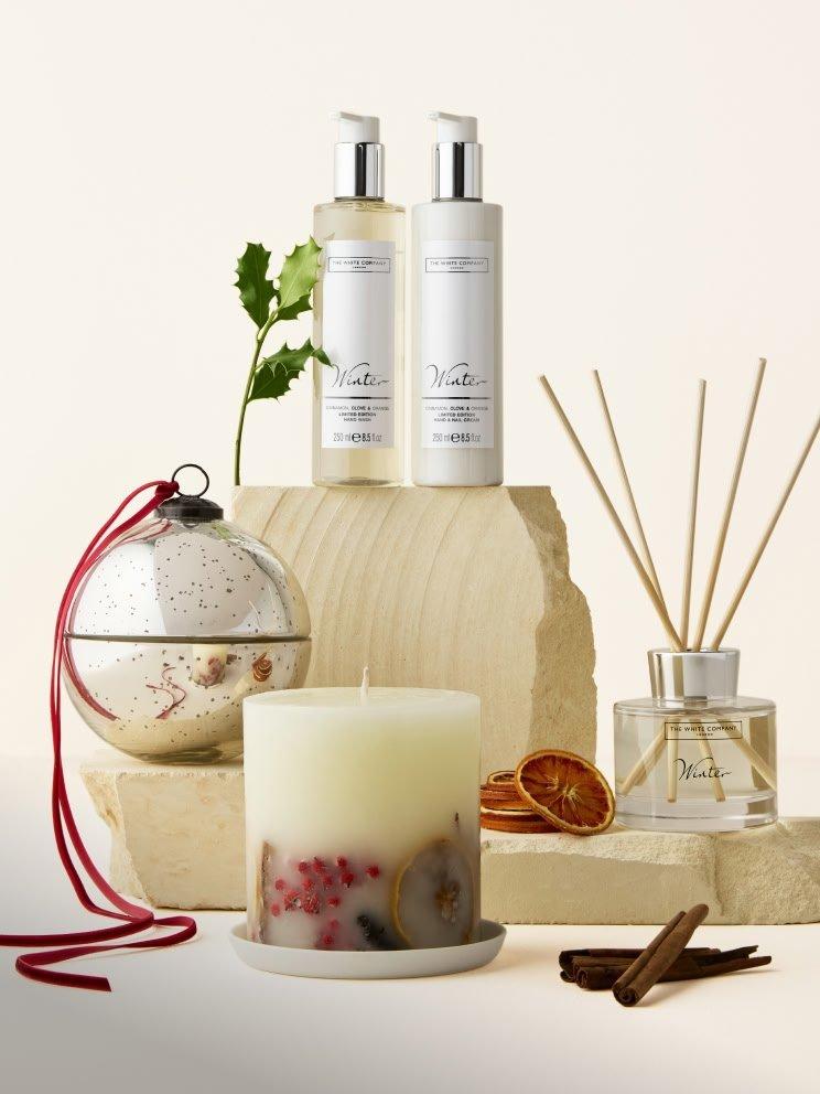 a candle, a candle holder, a candle and a candle holder