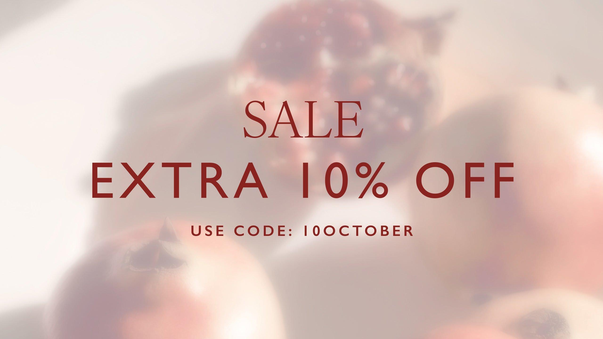 an advertisement for a sale on pomegranates with the words extra 10 % off