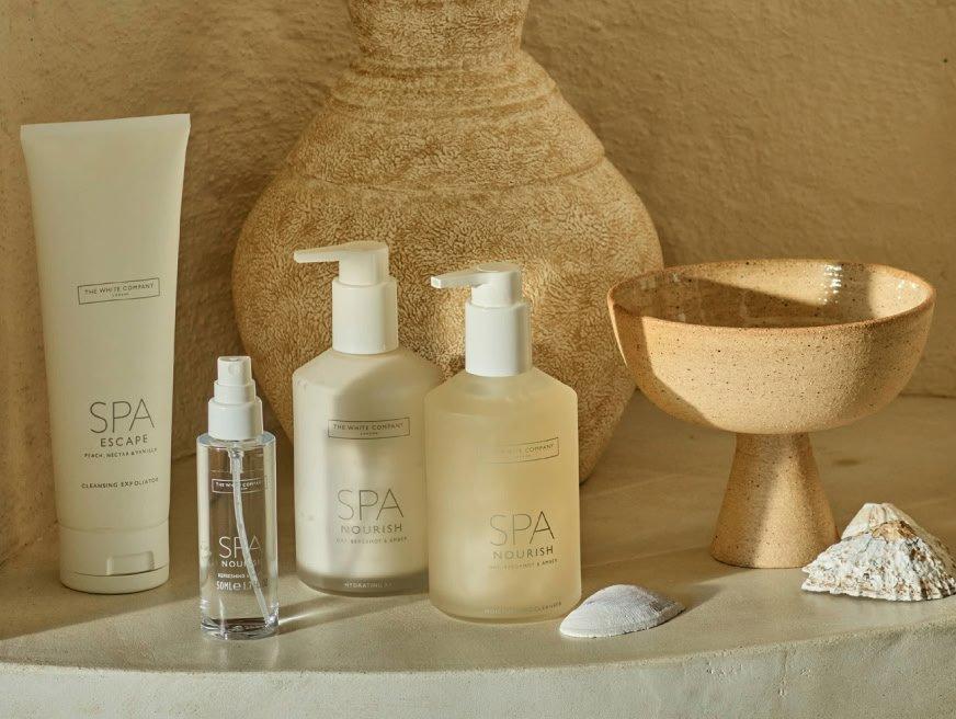 a collection of a collection of spa products on a shelf