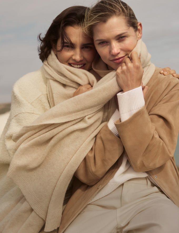 a white card sitting on top of a plate on a table