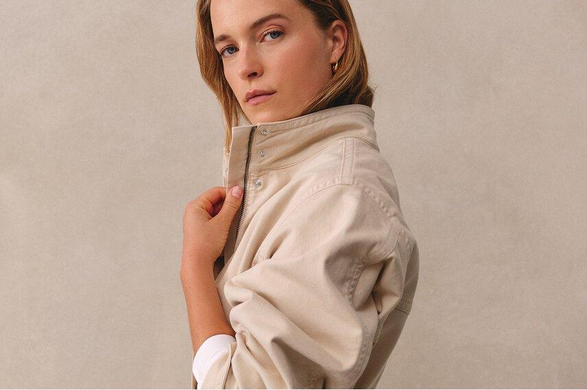 a close up of a gray fabric with a white border