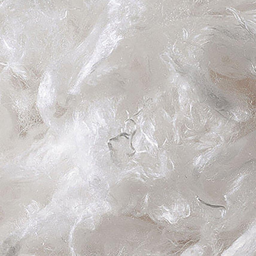 a close up of a bunch of cotton plants with seeds