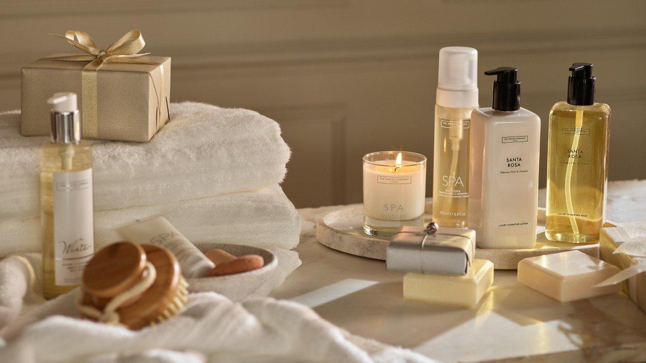 a bunch of different types of soaps and lotions on a table