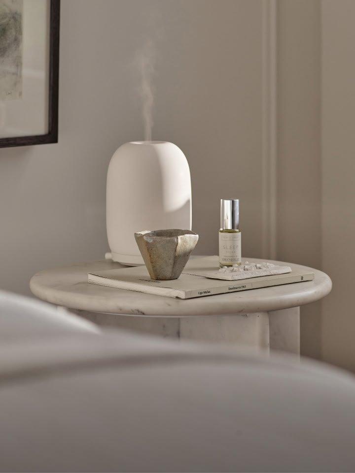 a bath products are on a counter next to a sponge