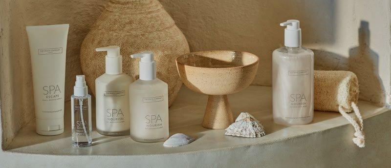 a collection of a collection of spa products on a shelf