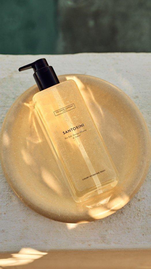 a bottle of a bottle of lotion sitting on a plate