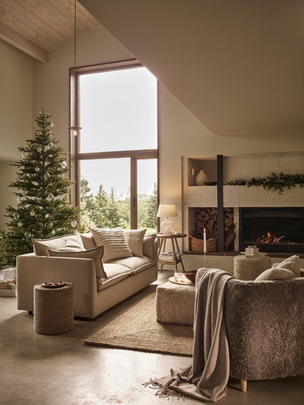 a living room with a chair and a lamp on a table