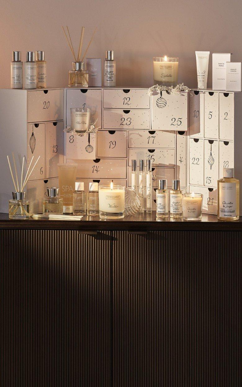 a display of a display of candles and other items on a table