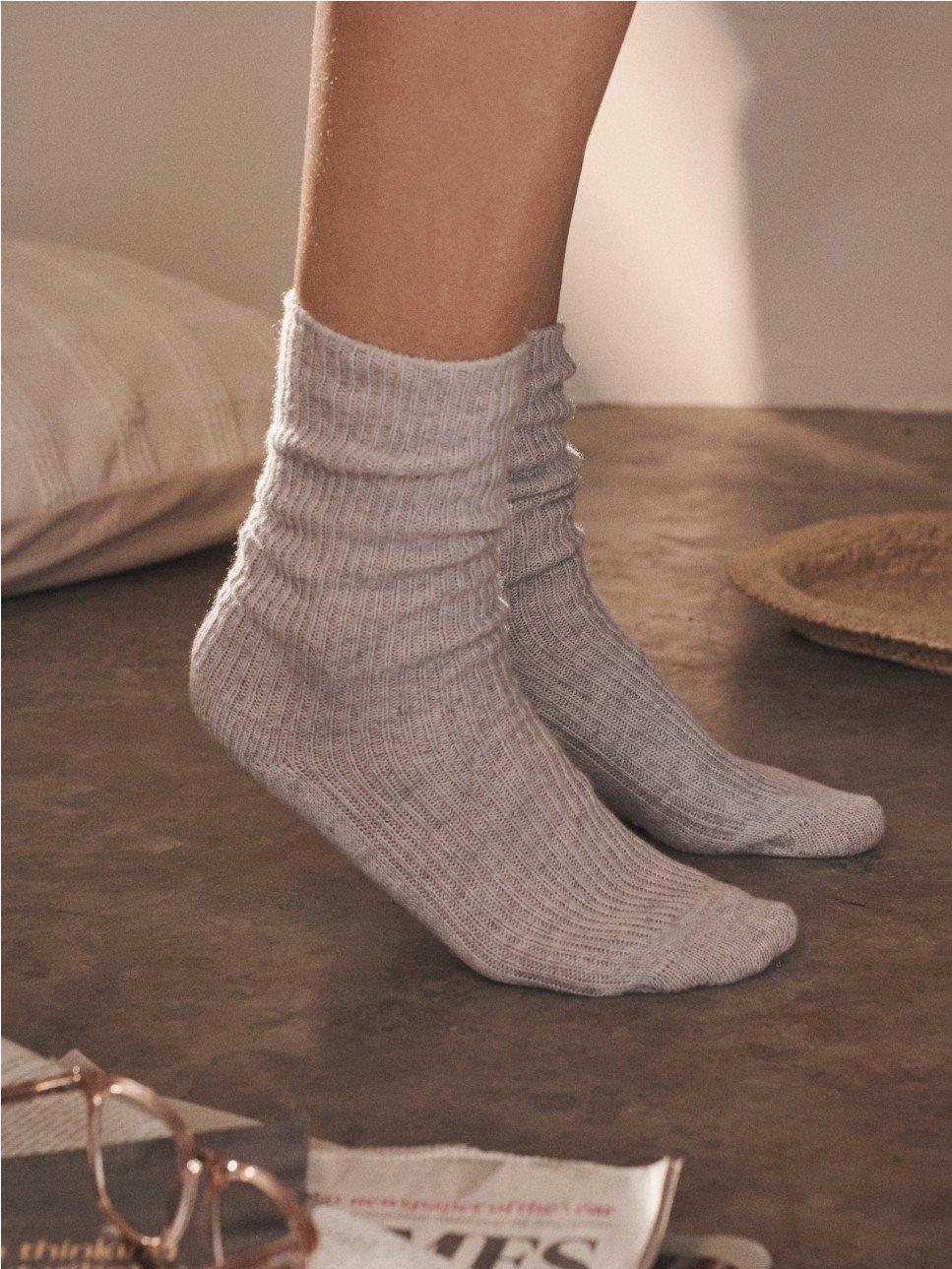 a pair of grey cashmere socks