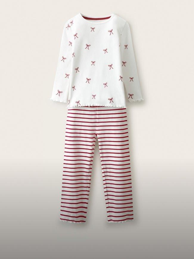 a baby girl's pajamas and pants set with red stripes